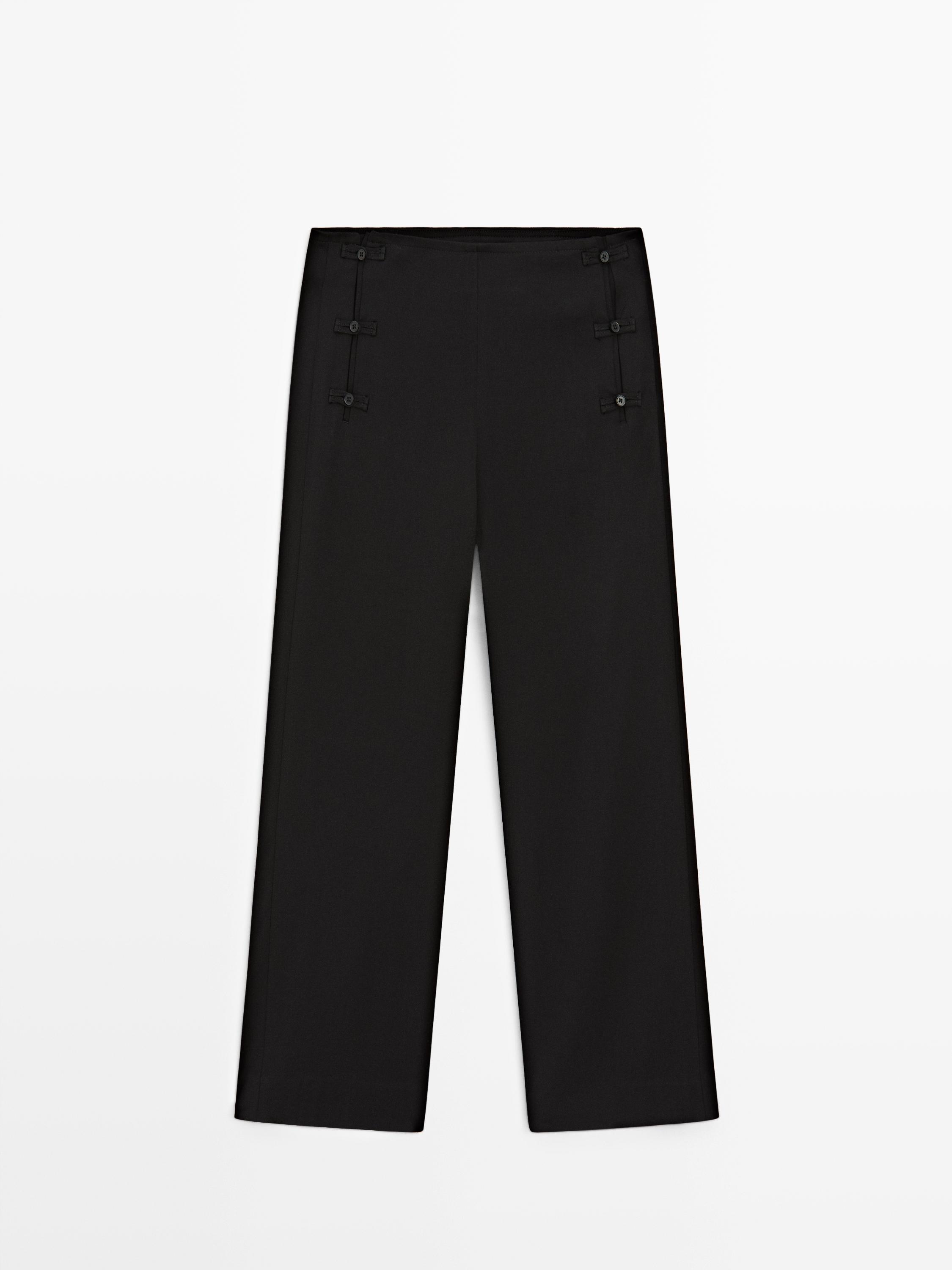 Pantalon capri avec boutons